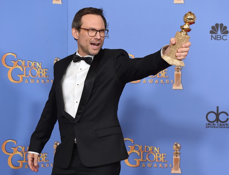 Christian Slater poses with the award for Best Supporting Actor in a series, limited series or TV movie for his role in \"Mr. Robot\" at the Golden Globe Awards, Jan. 10, 2016. (Photo by Jordan Strauss/Invision/AP)