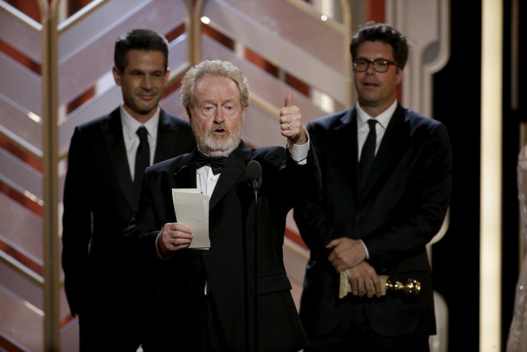 Director Ridley Scott accepts the award after \"The Martian\" won Best Motion Picture - Comedy at the 73rd Golden Globe Awards in Beverly Hills, Calif., Jan. 10, 2016. (Photo by Paul Drinkwater/NBC Universal/Reuters)