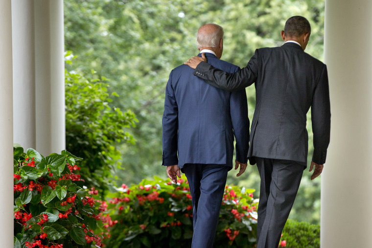 President Barack Obama walks with Vice President Joe Biden back to the Oval Office of the White House in Washington, D.C., June 25, 2015. (Photo by Pablo Martinez Monsivais/AP)