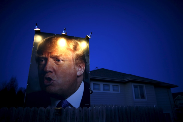 A picture of U.S. Republican presidential candidate Donald Trump hangs outside a house in West Des Moines