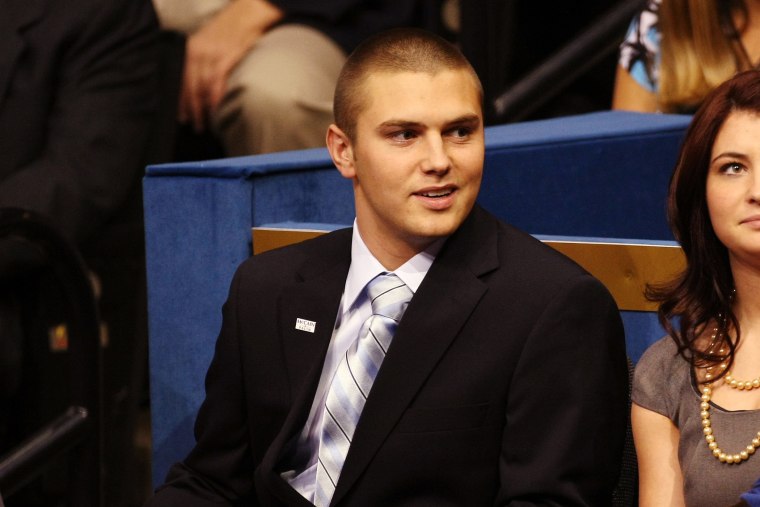 Track Palin sits with Willow Palin while holding Trig Palin on day three of the Republican National Convention (RNC) at the Xcel Energy Center on Sept. 3, 2008 in St. Paul, Minn. (Photo by Justin Sullivan/Getty)