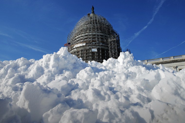 A pile of shoveled snow stands in the plaza on the east side of the U.S. Capitol Jan. 21, 2016 in Washington, DC. (Photo by Chip Somodevilla/Getty)