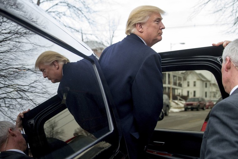 Republican presidential candidate Donald Trump departs after attending service at First Presbyterian Church in Muscatine, Iowa, Jan. 24, 2016. (Photo by Andrew Harnik/AP)