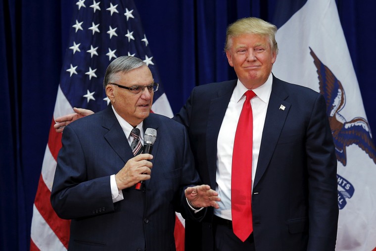 Republican presidential candidate Donald Trump is joined onstage by Maricopa County Sheriff Joe Arpaio at a campaign rally in Marshalltown, Iowa, Jan. 26, 2016. (Photo by Brian Snyder/Reuters)