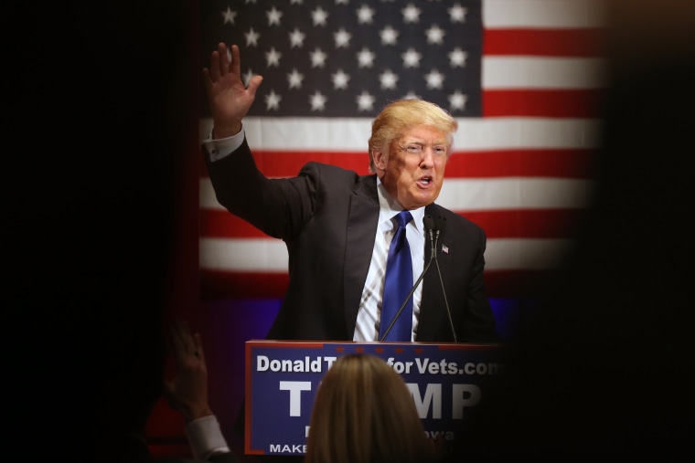 Republican presidential candidate Donald Trump waves tot the crowd at a event at Drake University in Des Moines, Iowa on Jan. 28, 2016. (Photo by Andrew Harnik/AP)