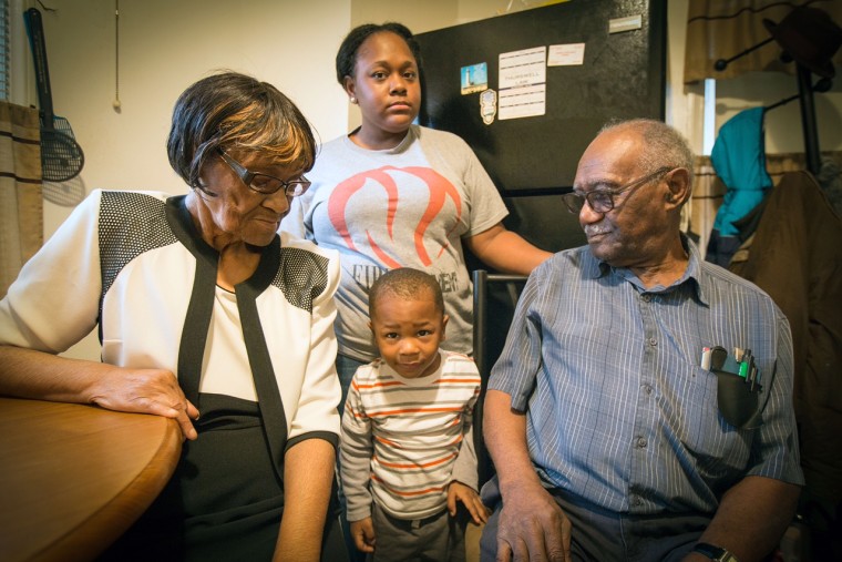 Elizabeth and Oscar Brown and their granddaughter Denettra and great-grandson Dana live in a Flint house with a lead service line and fear the 3-year-old has been poisoned.