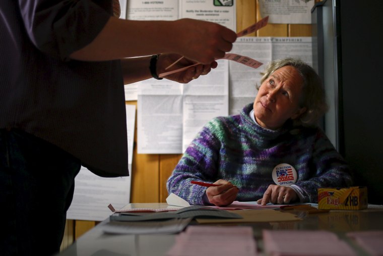 Officials count ballots in New Hampshire's first-in-the-nation primary at the town hall in Hart's Location, New Hampshire, Feb. 9, 2016. (Photo by Adrees Latif/Reuters)