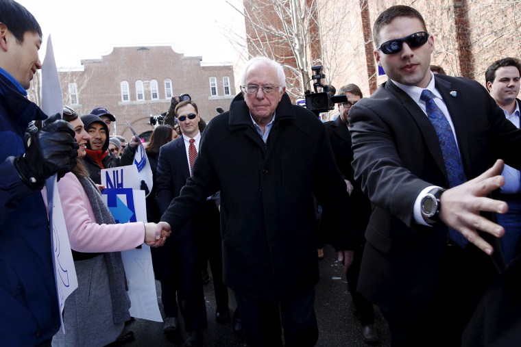 Bernie Sanders shakes hands with voters outside a polling place in Concord, N.H., Feb. 9, 2016. (Photo by Shannon Stapleton/Reuters)