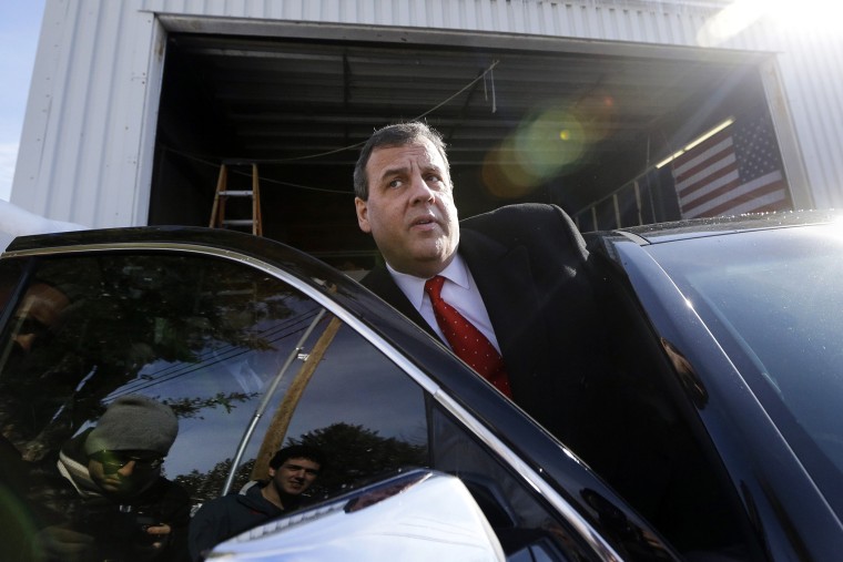 Republican presidential candidate, New Jersey Gov. Chris Christie gets in his car after a campaign event,, Feb. 6, 2016, in Bedford, N.H. (Photo by Elise Amendola/AP)