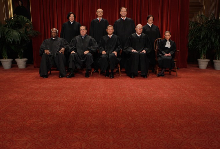 U.S. Associate Justices Clarence Thomas, Antonin Scalia, Chief Justice John Roberts, Associate Justices Anthony Kennedy, Ruth Bader Ginsburg, Sonia Sotomayor, Stephen Breyer, Samuel Alito and Elena Kagan. (Photo by Chip Somodevilla/Getty)
