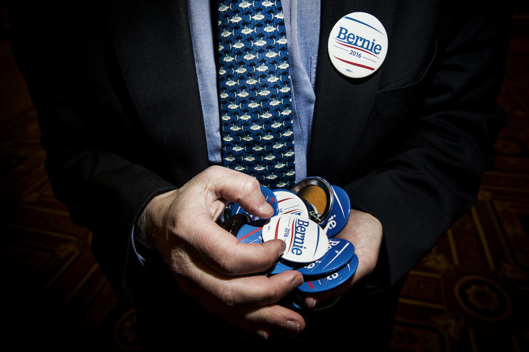 A Bernie Sanders supporters holds pins during the Democratic caucus in Las Vegas, Nev. on Feb. 20, 2015. (Photo by Dina Litovsky/Redux for MSNBC)