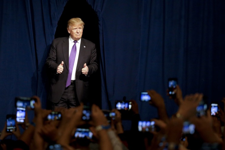 Republican presidential candidate Donald Trump arrives for a caucus night rally, Feb. 23, 2016, in Las Vegas, Nev. (Photo by Jae C. Hong/AP)