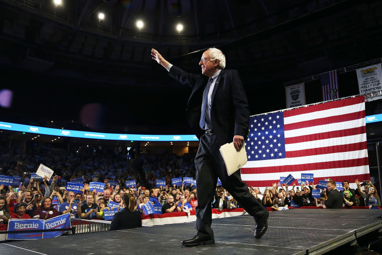Democratic presidential candidate Sen. Bernie Sanders (D-VT) waves as he is introduced during a Future to Believe rally at the Bon Secours Wellness Arena on Feb. 21, 2016 in Greenville, S.C. (Photo by Joe Raedle/Getty)