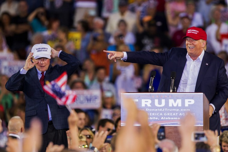 U.S. Republican presidential candidate Donald Trump introduces Alabama Senator Jeff Sessions Mobile during his rally at Ladd-Peebles Stadium on Aug. 21, 2015 in Mobile, Ala. (Photo by Mark Wallheiser/Getty)