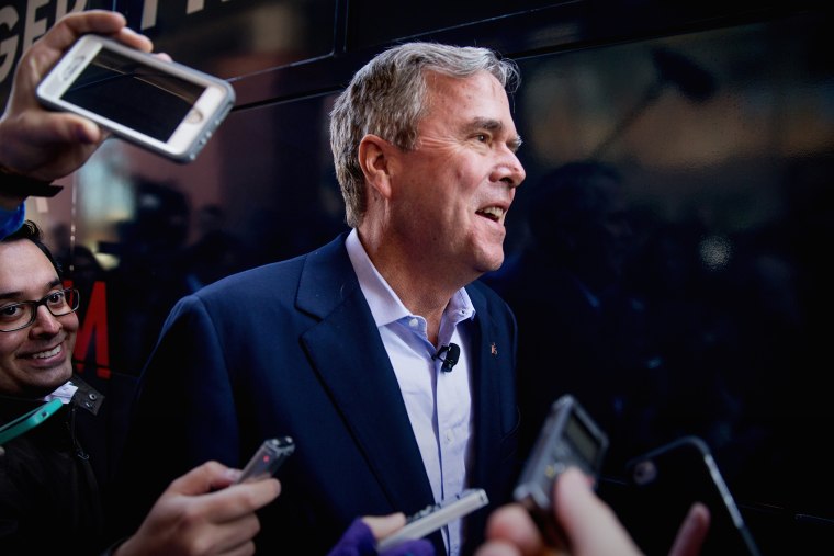 Republican presidential candidate, former Florida Gov. Jeb Bush speaks to the media as he heads towards his campaign bus in Columbia, S.C., Feb. 18, 2016. (Photo by Andrew Harnik/AP)