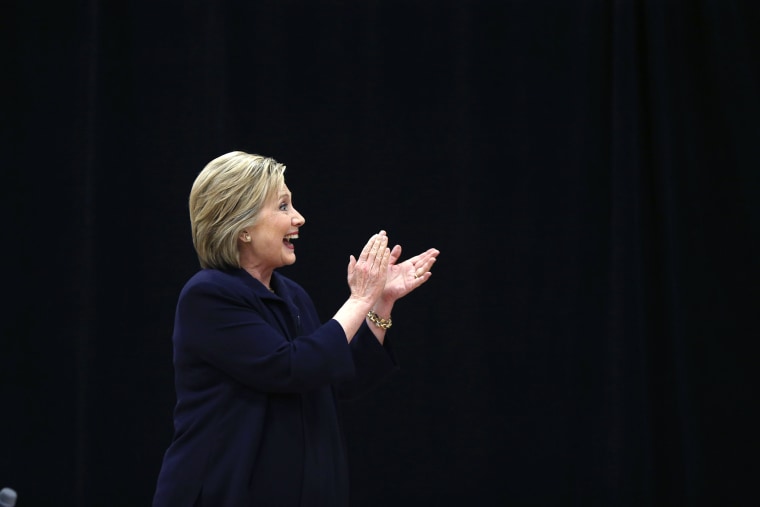 Democratic presidential candidate Hillary Clinton acknowledges the audience as she arrives to speak at a town hall style campaign event at the Williamsburg County Recreation Center in Kingstree, S.C., Feb. 25, 2016. (Photo by Gerald Herbert/AP)
