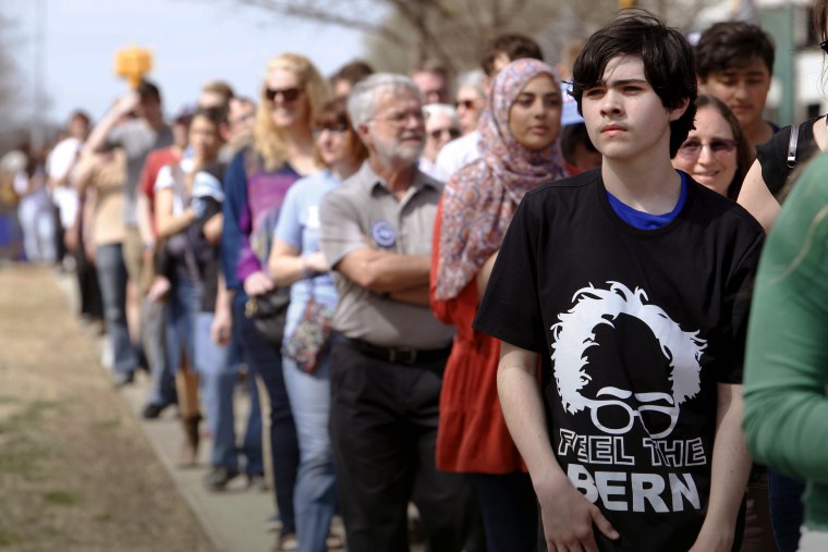 Supporters of Democratic presidential candidate Bernie Sanders line up to enter the venue of his campaign rally in Raleigh, N.C., March 11, 2016. (Photo by Jonathan Drake/Reuters)