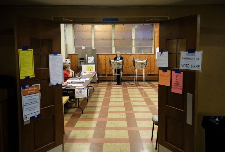 Voters cast electronic ballots during primary voting in Stark County March 15, 2016 in Canton, Ohio. (Photo by Brendan Smialowski/AFP/Getty)