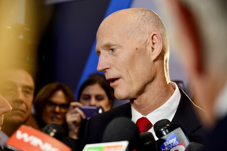 Fla. Gov. Rick Scott speaks with the media before the Republican presidential debate on the campus of the University of Miami on March 10, 2016 in Coral Gables, Fla. (Photo by Johnny Louis/SIPA/AP)
