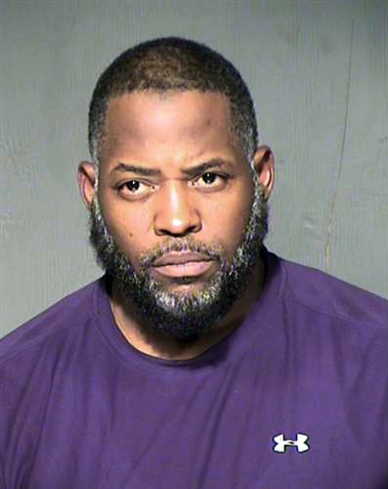 This undated law enforcement file booking photo provided by the Maricopa County, Ariz., Sheriff's Department shows Abdul Malik Abdul Kareem. (Photo by Maricopa County Sheriff's Department/AP)