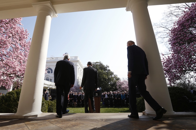 President Barack Obama is followed to the podium by his nominee to the Supreme Court and Vice President Joe Biden in the Rose Garden of the White House in Washington, March 16, 2016. (Photo by Kevin Lamarque/Reuters)