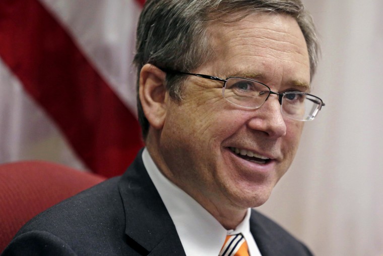 In this June 9, 2014 file photo, U.S. Sen. Mark Kirk R-Ill., speaks during an interview at his office in Chicago. (Photo by M. Spencer Green/AP)