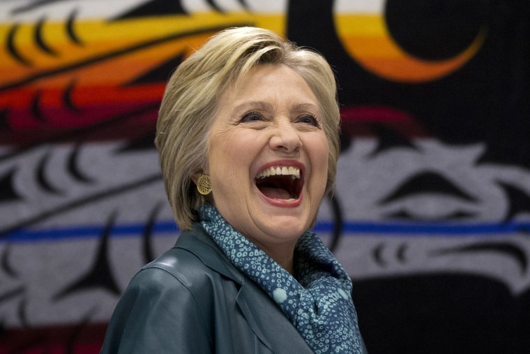 Democratic presidential candidate Hillary Clinton laughs as she participates in a roundtable with Washington Tribal Leaders at Chief Leschi School in Puyallup, Wash., March 22, 2016. (Photo by Carolyn Kaster/AP)