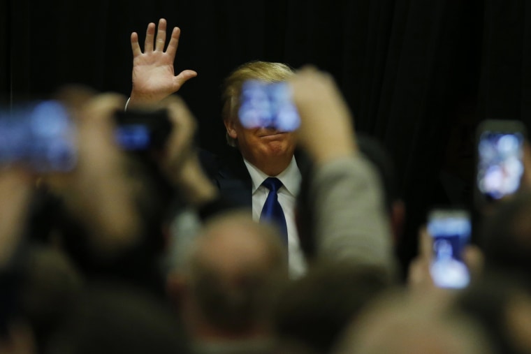 Republican presidential candidate Donald Trump speaks at a campaign event at Clinton Middle School in Clinton, Iowa, Jan., 30, 2015. (Photo by Carlos Barria/Reuters)