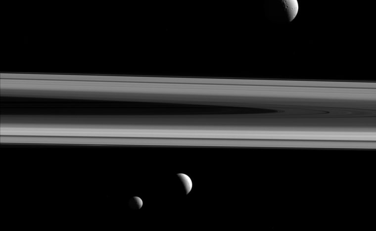 Three of Saturn's moons -- Tethys, Enceladus and Mimas -- are captured in this group photo from NASA's Cassini spacecraft.
