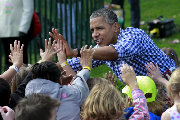 U.S. President Barack Obama greets children gathered for the annual White House Easter Egg Roll on the South Lawn of the White House in Washington, March 28, 2016. (Photo by Yuri Gripas/Reuters)