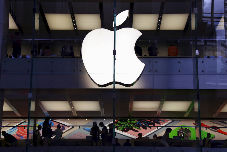 Customers can be seen inside the Apple store in central Sydney, Australia, in this picture taken March 18, 2016. (Photo by David Gray/Reuters)