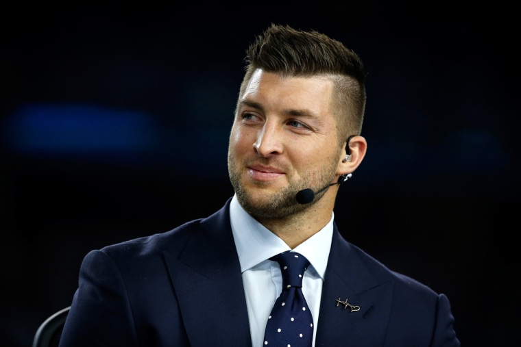 Tim Tebow speaks on air before the Goodyear Cotton Bowl at AT&T Stadium on December 31, 2015 in Arlington, Texas. (Photo by Scott Halleran/Getty)