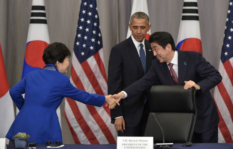President Obama, South Korea's President Park Geun-Hye (L) and Japan's Prime Minister Shinzo Abe, after a trilateral meeting on the sidelines of the Nuclear Security Summit in Washington, DC, March 31, 2016. (Photo by Mandel Ngan/AFP/Getty)