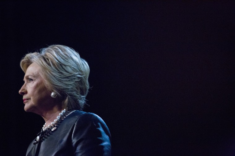 Hillary Clinton pauses while speaking during a campaign event at the Apollo Theater in New York, March 30, 2016. (Photo by John Taggart/Bloomberg/Getty)