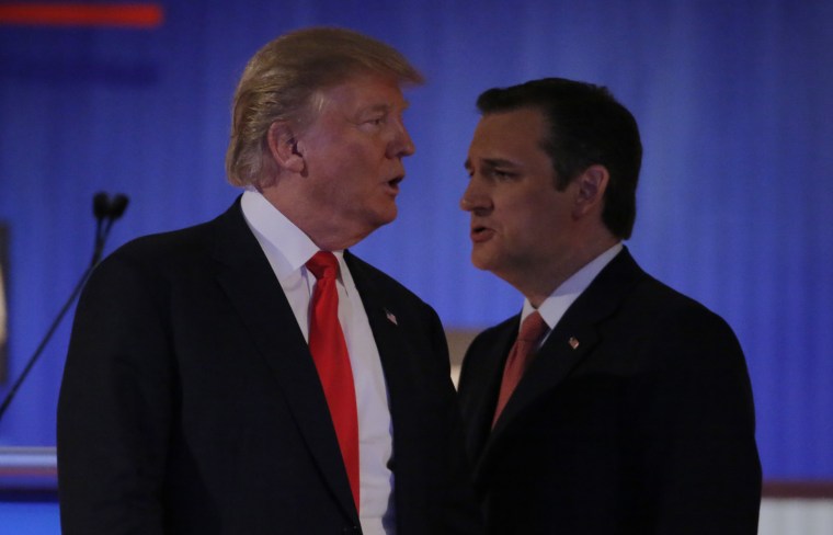 Republican U.S. presidential candidates Donald Trump and Ted Cruz cross paths during a break at the Fox Business Network Republican presidential candidates debate in North Charleston, S.C., Jan. 14, 2016. (Photo by Chris Keane/Reuters)