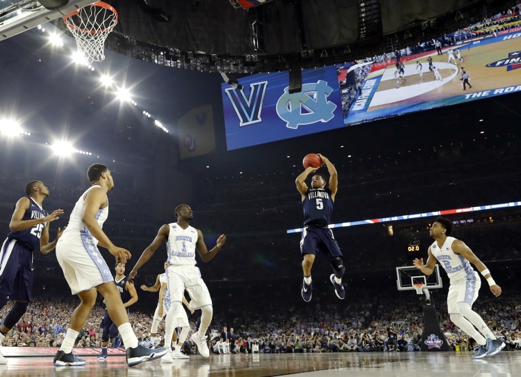 Villanova's Phil Booth (5) shoots during the first half of the NCAA Final Four tournament college basketball championship game against North Carolina, Monday, April 4, 2016, in Houston. (Photo by David J. Phillip/AP)