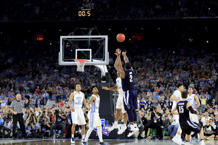 Kris Jenkins #2 of the Villanova Wildcats shoots the game-winning three pointer to defeat the North Carolina Tar Heels 77-74 in the 2016 NCAA Men's Final Four National Championship game on April 4, 2016 in Houston, Texas. (Photo by Ronald Martinez/Getty)