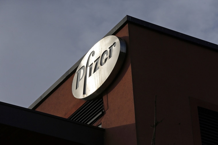 A company logo is seen at a Pfizer office. (Photo by Cathal McNaughton/Reuters)