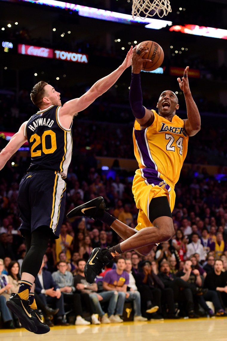 Kobe Bryant #24 of the Los Angeles Lakers goes up for a shot against Gordon Hayward #20 of the Utah Jazz in the fourth quarter at Staples Center on April 13, 2016 in Los Angeles, Calif. (Photo by Harry How/Getty)