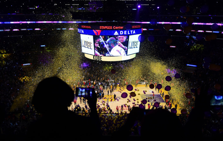 Balloons and confetti rain on the court following Kobe Bryant's final game as a Laker in their season-ending NBA western division matchup aginst the Utah Jazz in Los Angeles, Calif., on April 13, 2016. (Photo by Frederic J. Brown/AFP/Getty)