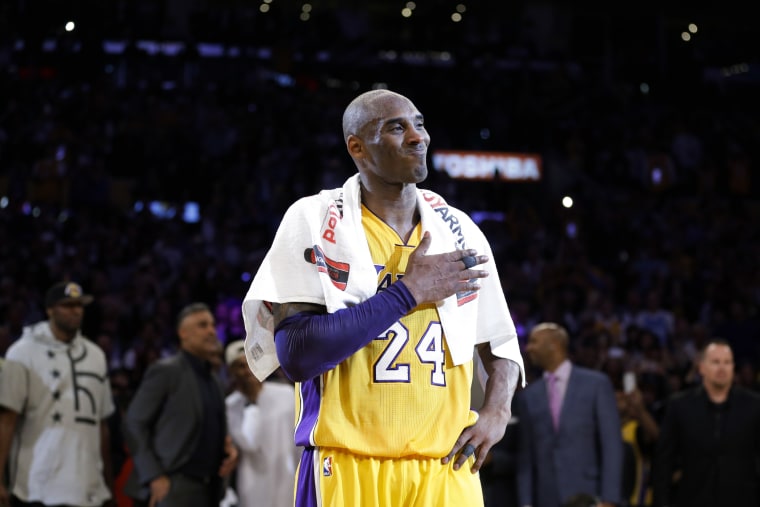 Los Angeles Lakers' Kobe Bryant pounds his chest after the last NBA basketball game of his career, against the Utah Jazz, April 13, 2016, in Los Angeles, Calif. (Photo by Jae C. Hong/AP)