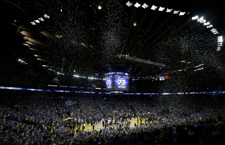 Confetti falls after the Golden State Warriors beat the Memphis Grizzlies 125-104 in an NBA basketball game in Oakland, Calif., April 13, 2016. (Photo by Jeff Chiu/AP)