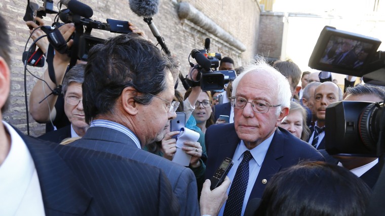 U.S. Democratic presidential candidate Bernie Sanders speaks with media and supporters during his visit to the Vatican, April 15, 2016. (Photo by Stefano Rellandini/Reuters)