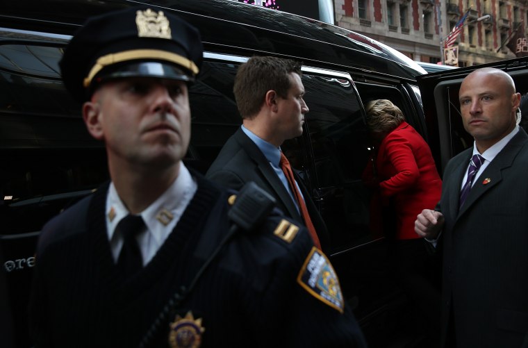 Democratic presidential candidate former Secretary of State Hillary Clinton gets into her van after visiting picketing Verizon workers outside of a Verizon store on April 13, 2016 in New York City. (Photo by Justin Sullivan/Getty)