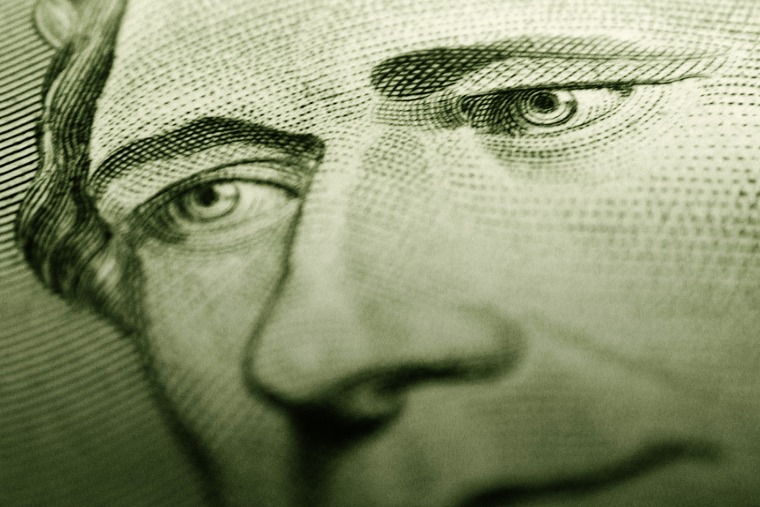 Detail of Alexander Hamilton's portrait on a $10 bill. (Photo by Digital Art/Corbis)