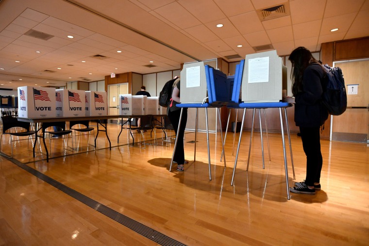 Students vote in the precinct located in the HUB-Robeson Center on the Penn State University campus in University Park, Pa. on April 26, 2016. (Photo by Nabil K. Mark/Centre Daily Times/AP)
