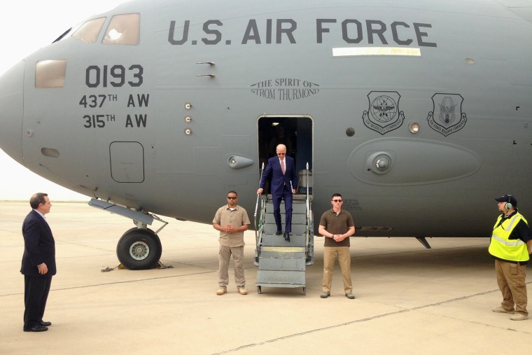 Vice President Joe Biden steps off a C-17 military transport plane upon his arrival in Baghdad, Iraq, Thursday, April 28, 2016. (Photo by Josh Lederman/AP)