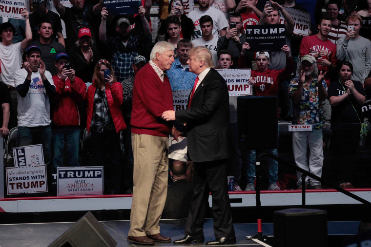 Republican presidential candidate Donald Trump shakes hands with former Indiana University basketball coach Bobby Knight during a campaign rally at the Indiana Farmers Coliseum on April 27, 2016 in Indianapolis, Indiana. (Photo by John Sommers II/Getty)