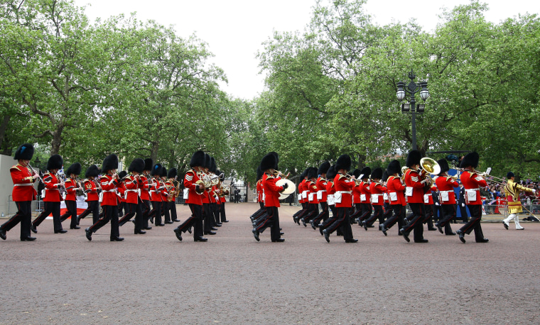 Ceremonial guards perform along the Mall ahead of the Royal Wedding of Prince William to Catherine Middleton at Westminster Abbey on April 29, 2011 in London, England. (Photo by Julian Finney/Getty)