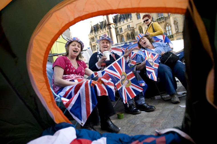 (L-R) Rosalind Osborne, Tina Pittock and Cynthia Fisher pitched their tent and are camping out for the royal wedding in front of Westminster Abbey in London, England on April 27, 2011. (Photo by Linda Davidson/The Washington Post/Getty)